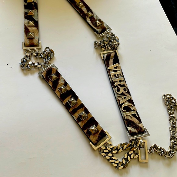 Versace Accessories - Versace belt with silver stud and it has a zebra pattern very furry beautiful
